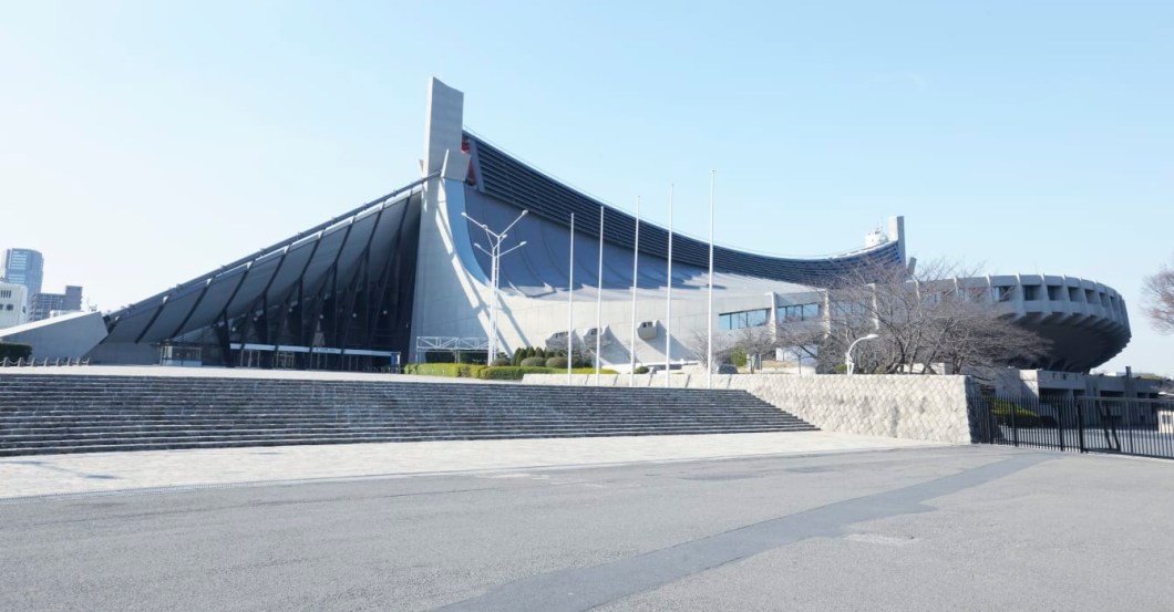 O Estádio Nacional de Yoyogi data de 1964, quando Tóquio sediou pela primeira vez os Jogos Olímpicos. A arena, que foi construída para sediar competições de basquete e esportes de água, é famosa pelo design de seu teto suspenso, projetado por Kenzo Tange. Desta vez será palco do handebol, badminton e rugby em cadeira de rodas. O Estádio Nacional de Yoyogi data de 1964, quando Tóquio sediou pela primeira vez os Jogos Olímpicos. A arena, que foi construída para sediar competições de basquete e esportes de água, é famosa pelo design de seu teto suspenso, projetado por Kenzo Tange. Desta vez será palco do handebol, badminton e rugby em cadeira de rodas.