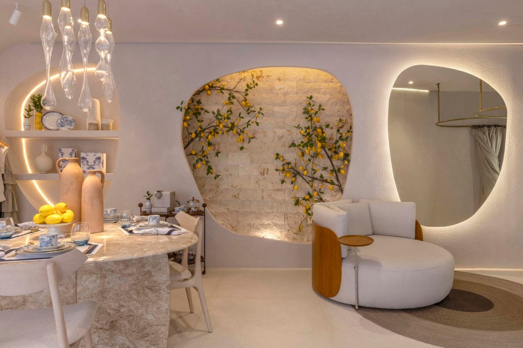 Deyse Cristina Arquitetura - Loja Lilee. O ambiente traz uma narrativa entre a moda moderna e a arquitetura contemporânea brasileira. Projetado pela arquiteta Deyse Cristina que foca no design nacional e na biofilia para destacar a marca autoral. Um agradável espaço inspirado nas curvas do corpo feminino e nos elementos da natureza, relembrando essa característica viva do habitat tocantinense. A paleta de cores neutras de tons que acalmam, despertam sentimentos de acolhimento e de envolvimento, mas, principalmente, destacam as peças da nova coleção da marca. Deyse Cristina Arquitetura - Loja Lilee. O ambiente traz uma narrativa entre a moda moderna e a arquitetura contemporânea brasileira. Projetado pela arquiteta Deyse Cristina que foca no design nacional e na biofilia para destacar a marca autoral. Um agradável espaço inspirado nas curvas do corpo feminino e nos elementos da natureza, relembrando essa característica viva do habitat tocantinense. A paleta de cores neutras de tons que acalmam, despertam sentimentos de acolhimento e de envolvimento, mas, principalmente, destacam as peças da nova coleção da marca.